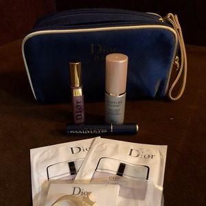 Dior makeup bag with samples and Dior pin